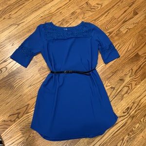 Blue Dress with lace embellishments.